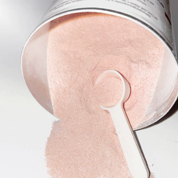 Das FitLine Women+ Plus Pulver und Dosierlöffel